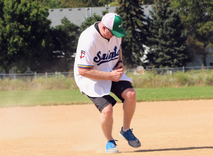 Ouch!  Firefighter Nathan Beitler tries to catch the ball during a vintage baseball game Sunday in Woodbury. The game was played according to 1869 rules so no gloves were allowed. 