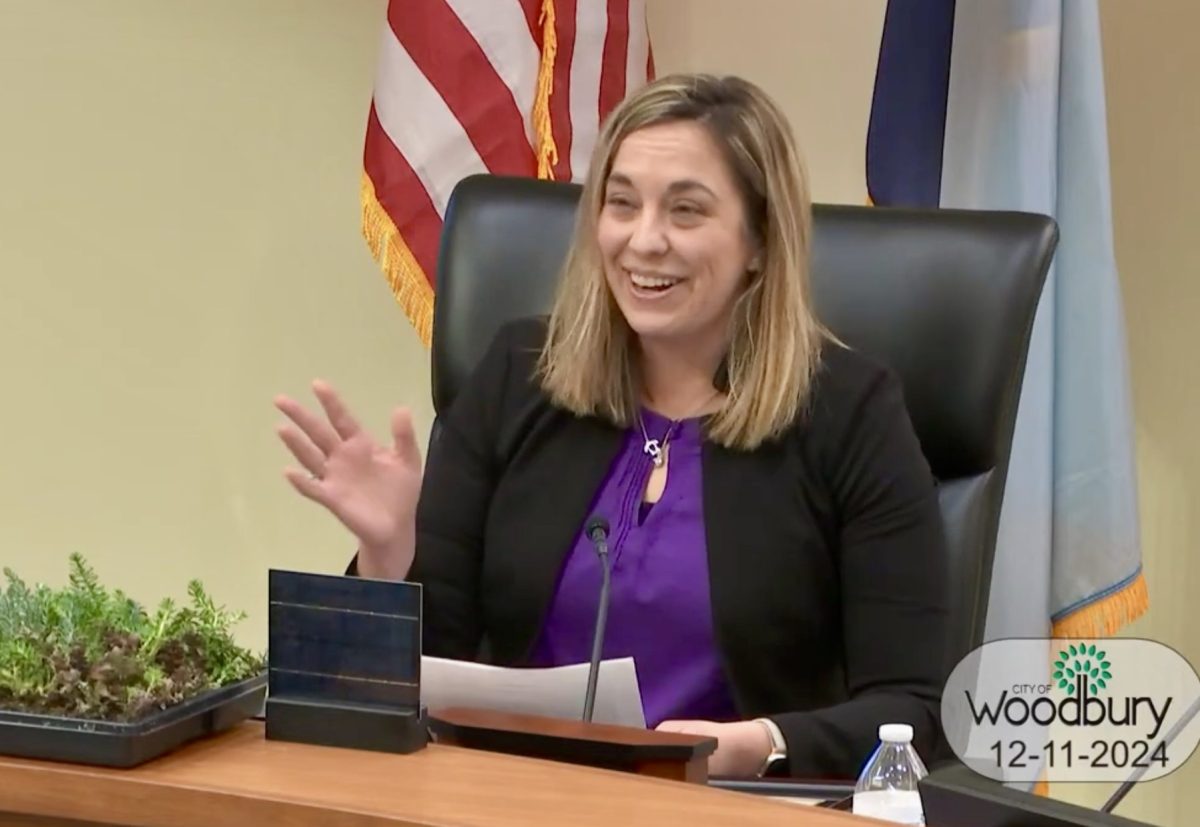 



Andrea Date addresses the crowd about her retirement from the Woodbury City Council. Photo via online stream.