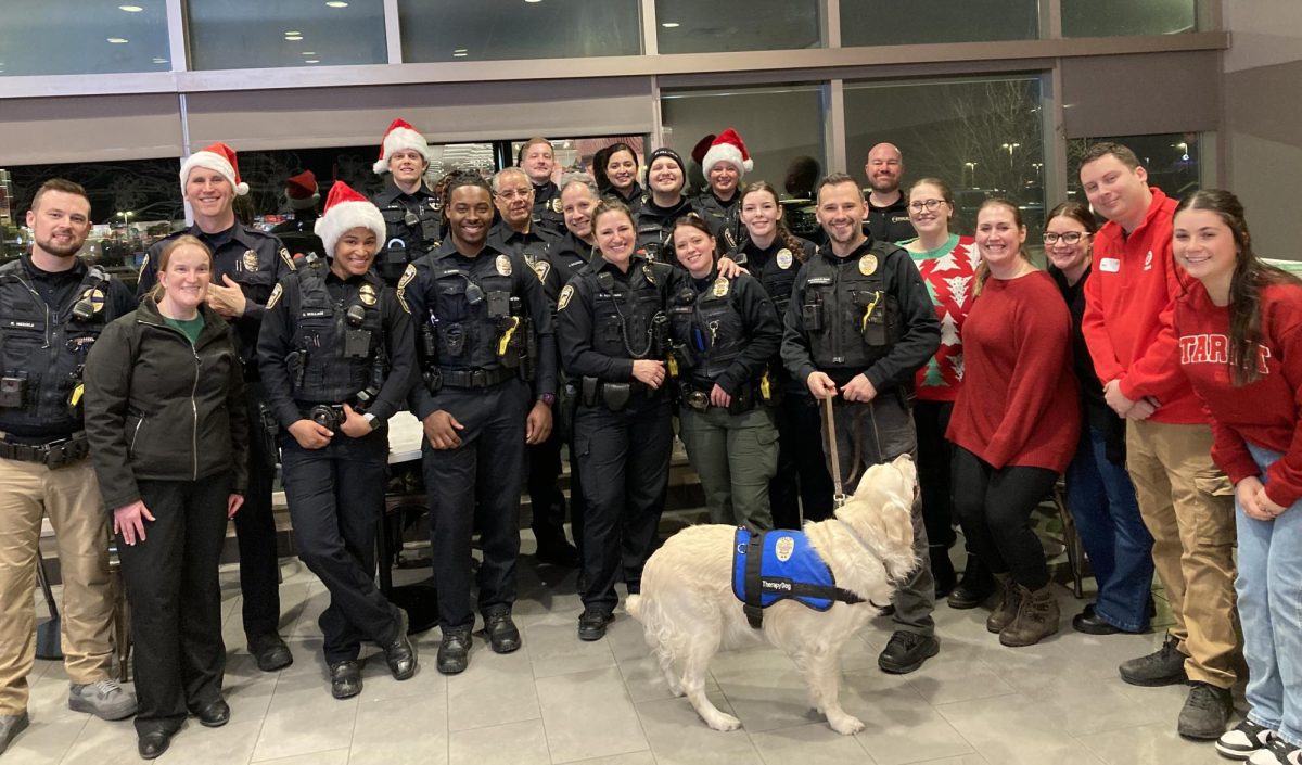 Woodbury Police and Woodbury high school students take part in the Heroes and Helpers event. 