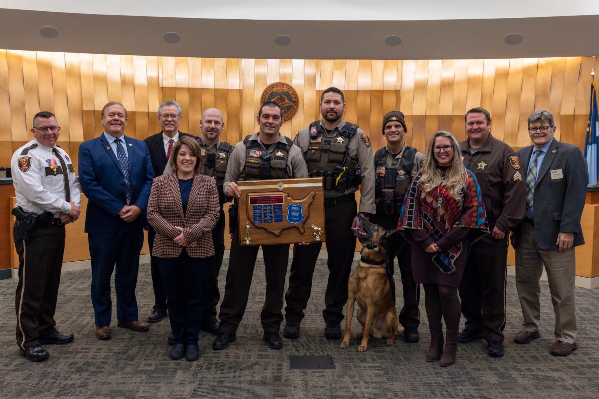 Washington County Sheriff Dan Starry, Commissioner Stan Karwoski, Commissioner Fran Miron, Commissioner Karla Bigham, Deputy Sheriffs Josh Liebenow, Brandon Yetter, Nate Thienes, and Chris Majeski, Commissioner Michelle Clasen, Sergeant Ty Jacobson, and Commissioner Gary Kriesel. Also pictured K9 Goose. Photo: Contributed.