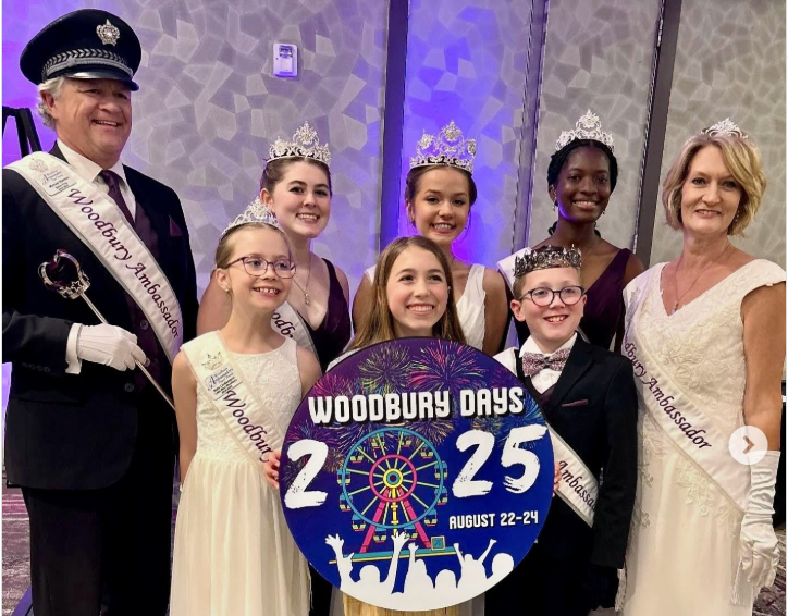 Mia Schreiber holds the winning button design for this year's Woodbury Days. Photo: Contributed.