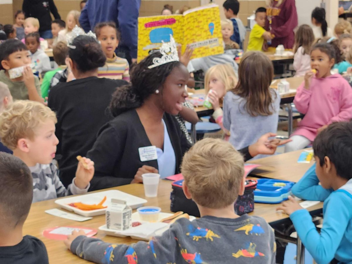 Current Woodbury Ambassador Kerubo Mekenye shares her leadership style with a group of local elementary school kids.