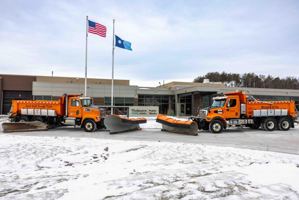This year’s Name a Snowplow Contest winners Duck Duck Orange Truck and Blizzard of Oz in front of the Washington County Public Works North Shop in Stillwater Township. (Courtesy photo from Washington County)
