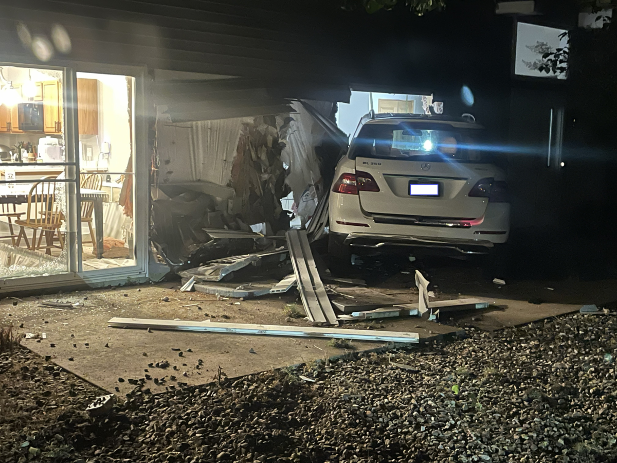 The driver hit another townhome before crashing into a third unit, stopping halfway inside a dining room.