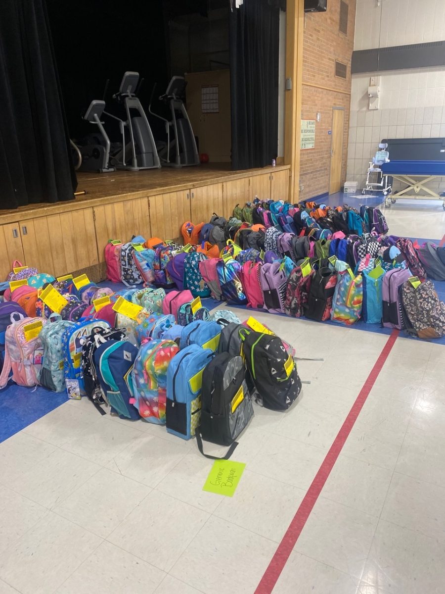 Backpacks are lined up for distribution from past Stuff the Bus school supply drives. (Courtesty of United Way—Washington County East.)